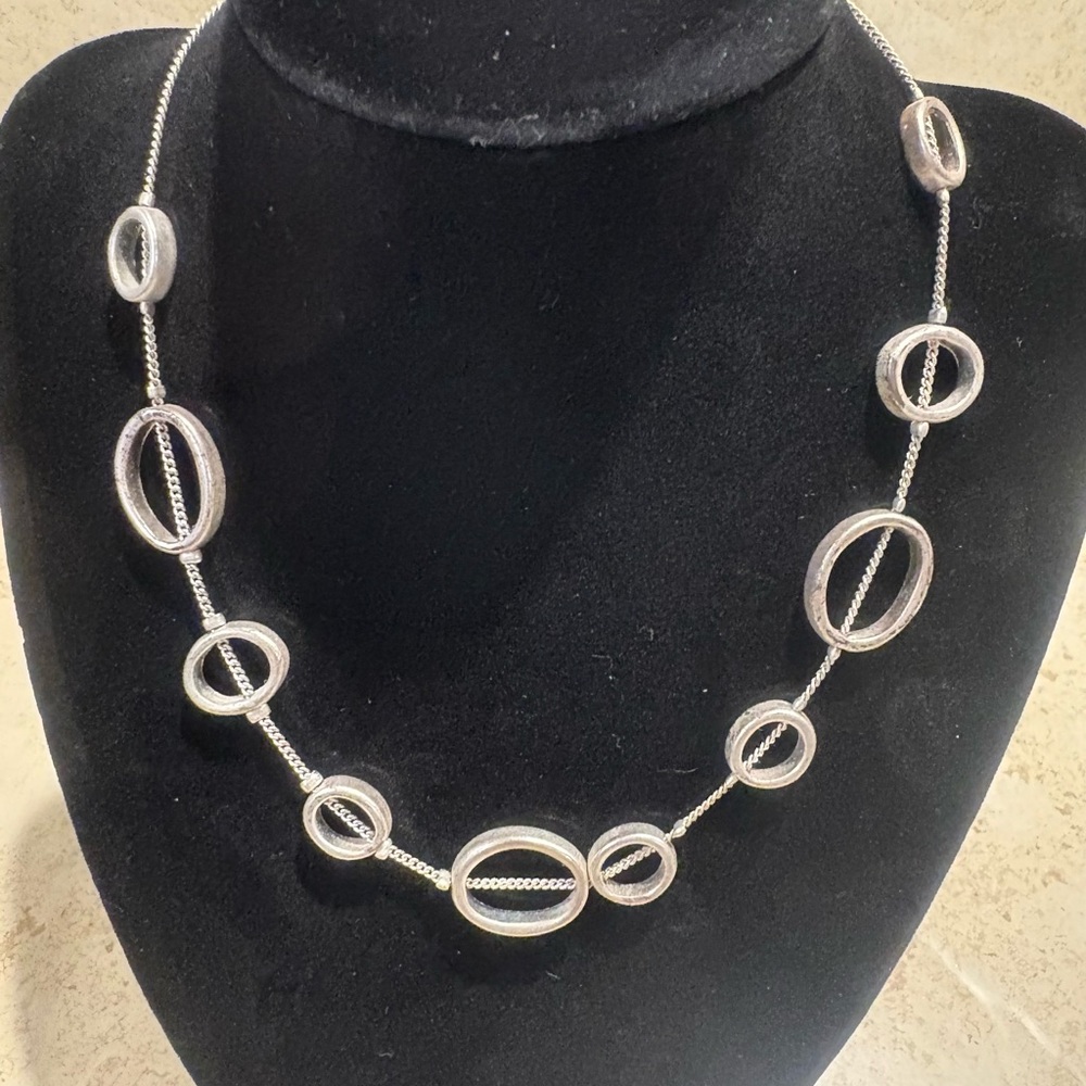 Elegant Silver Necklace with Oval Accents